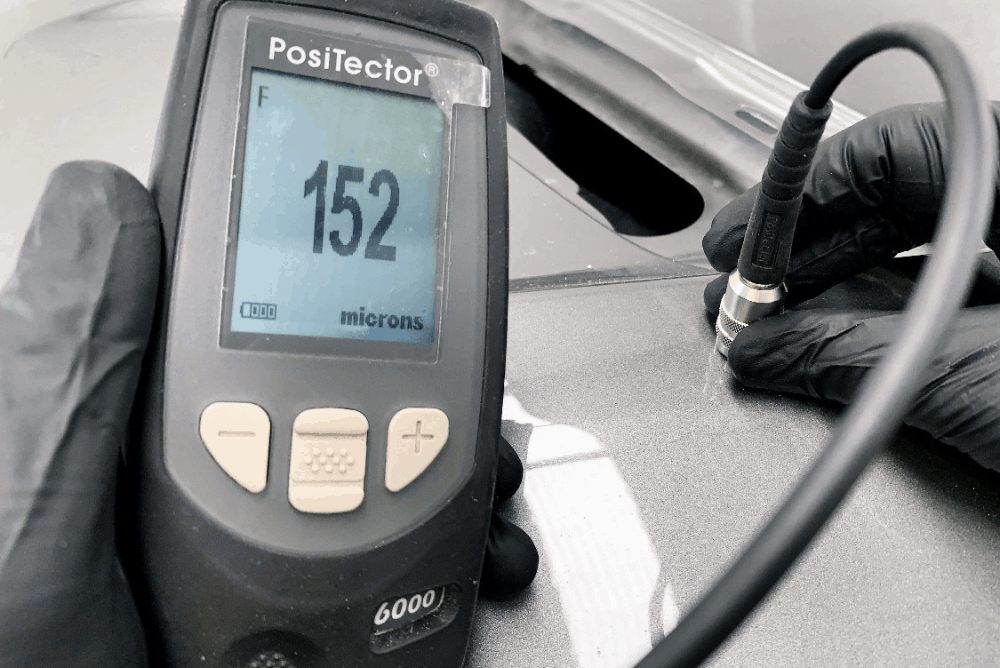 Measuring vehicle paint thickness with Positector